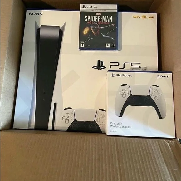 Brand new PlayStation5 with all accessories intact and also a Spider-Man disc
